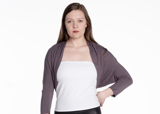woman wearing a graphite grey three-quarter sleeve bamboo shrug