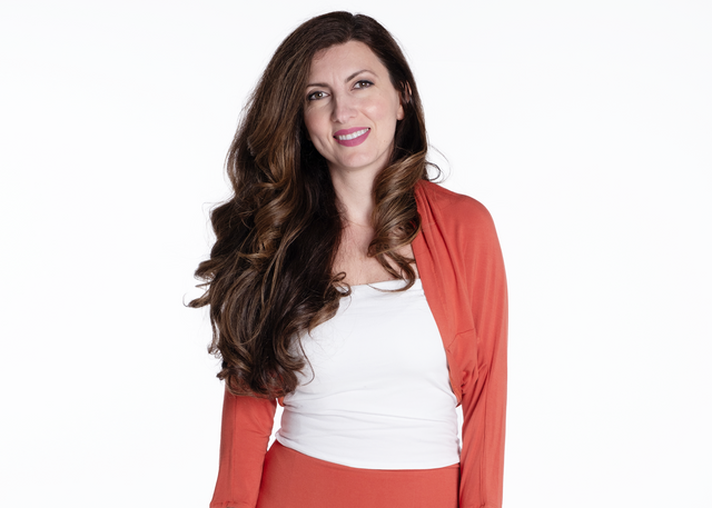 woman wearing a persimmon three-quarter sleeve bamboo shrug