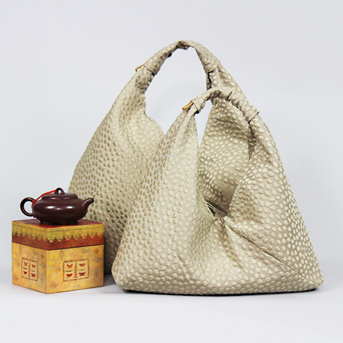 beige fabric textured hobo bag