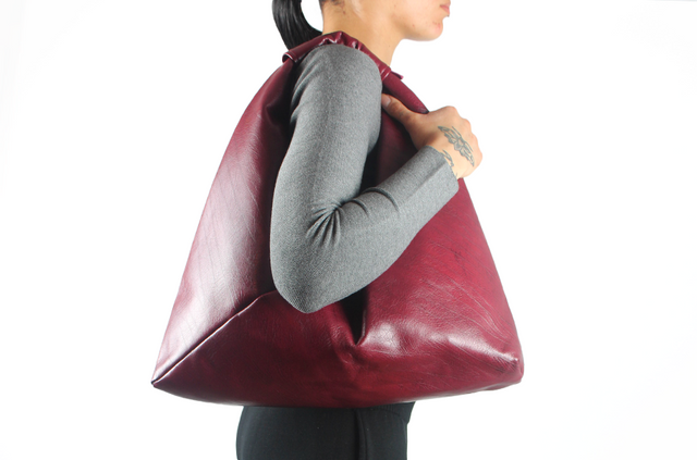 red marbled 18" x 18" vegan leather hobo bag