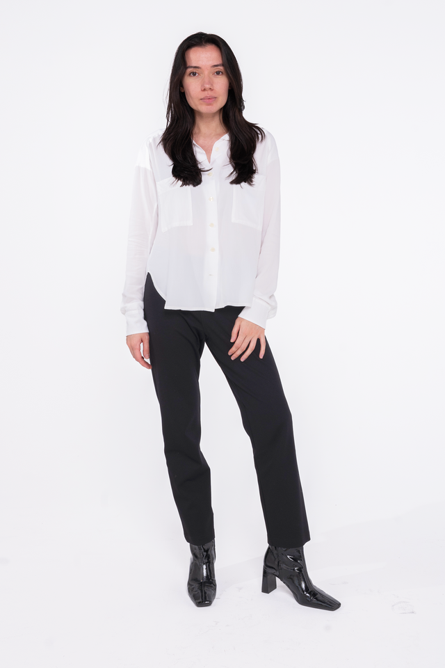 woman wearing standard length black ponte pant