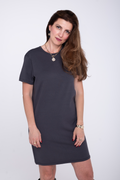woman wearing a slate grey boxy knit t-shirt dress