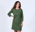 woman wearing a fern green french terry raglan dress