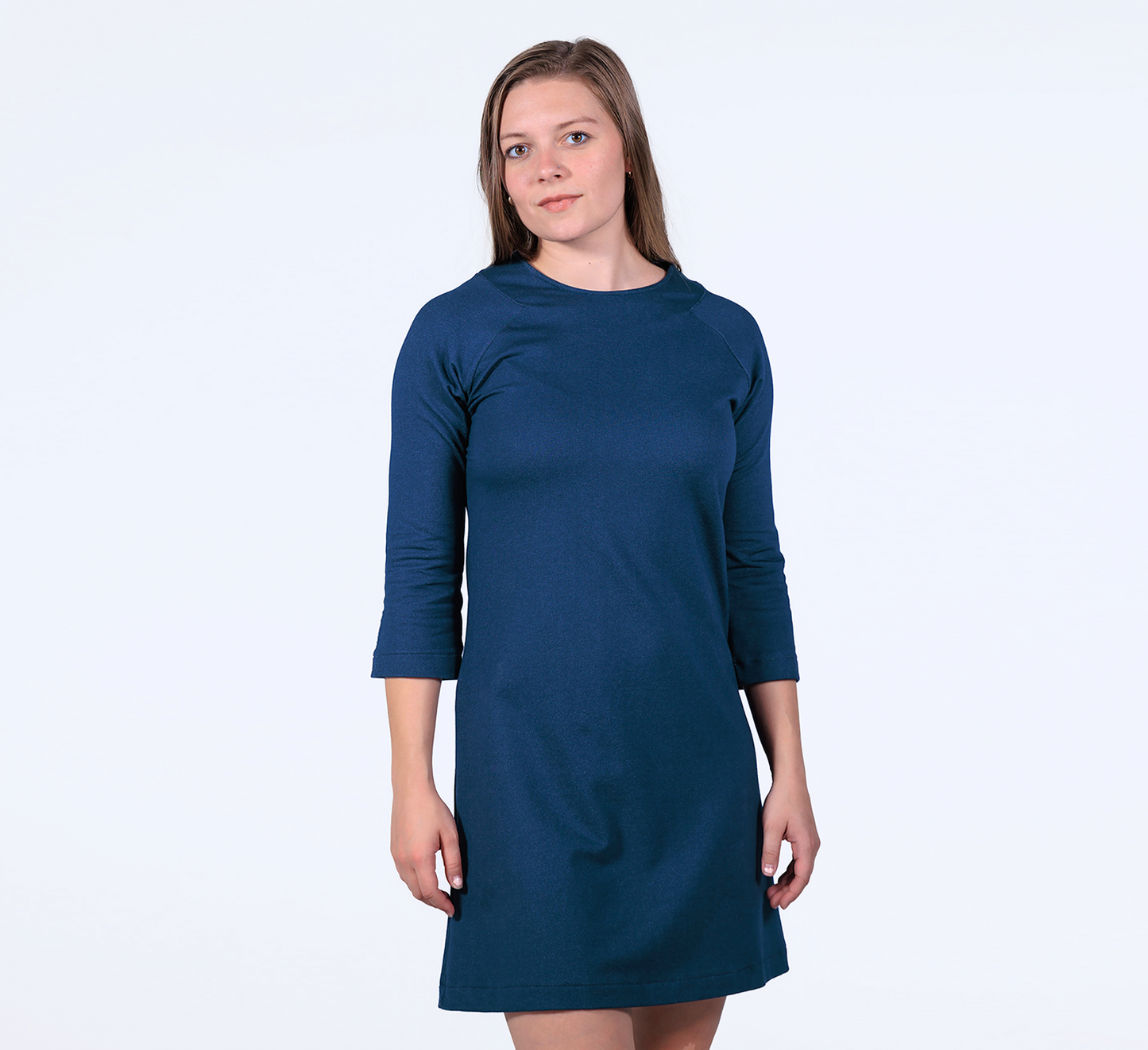 woman wearing a indigo french terry raglan dress