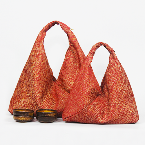 red fabric textured hobo bag
